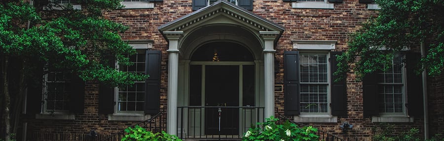 Window and door on front of house