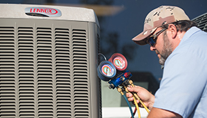 Man fixing air conditioner