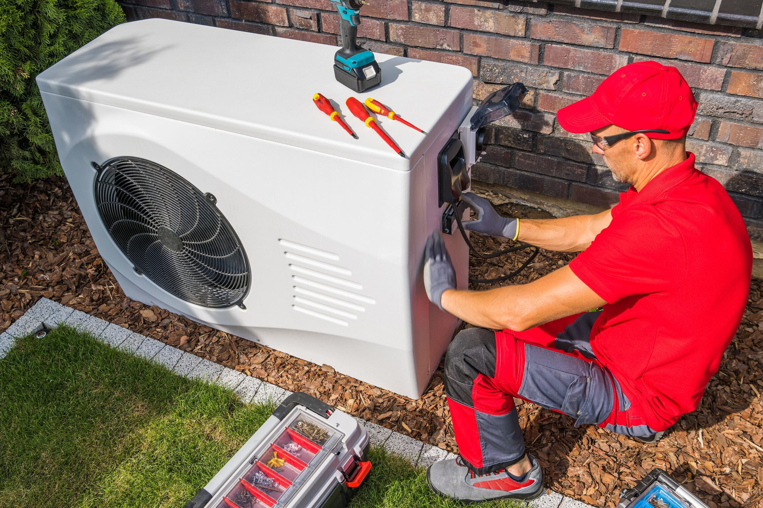 Man working on AC Unit